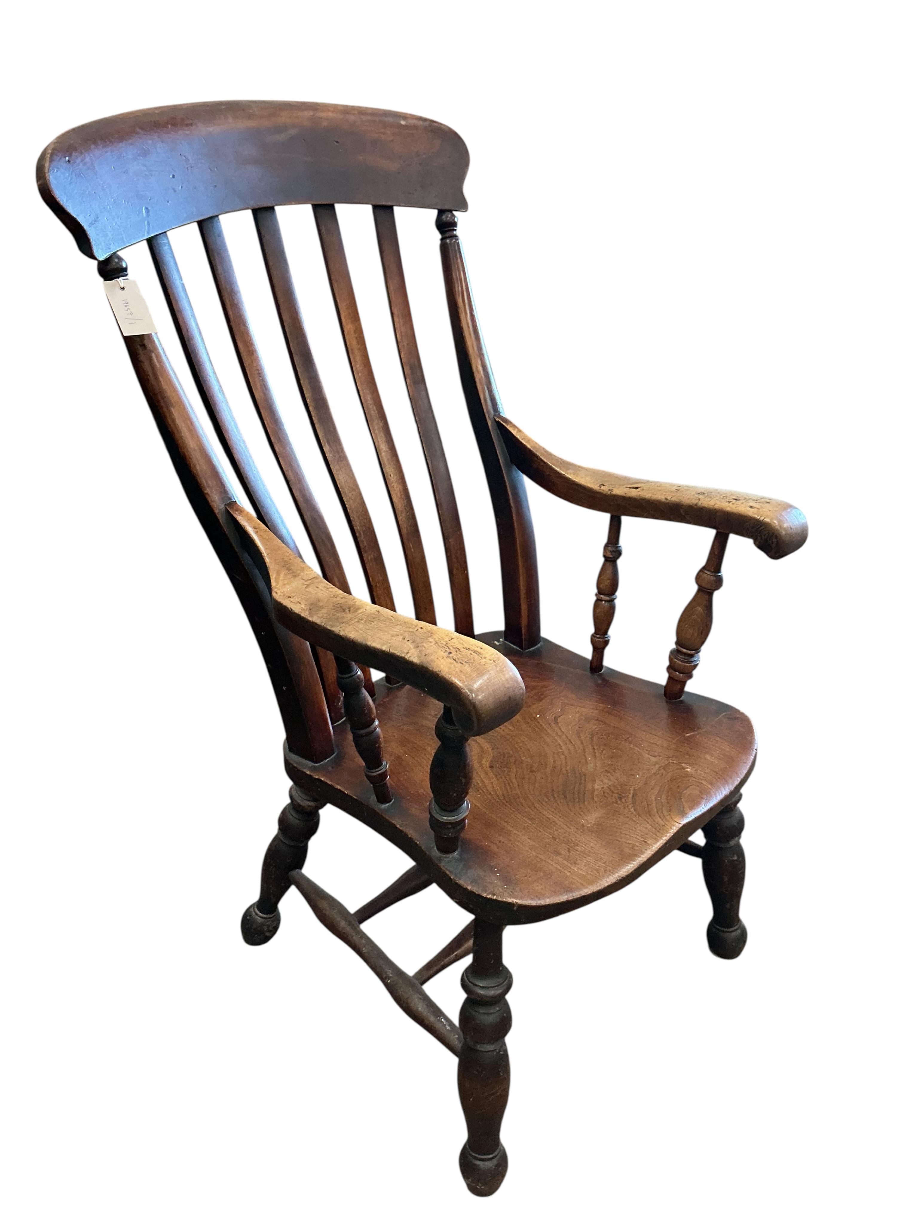 A Victorian elm and beech Windsor lathe back armchair, width 54cm, depth 52cm, height 108cm